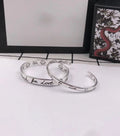 GUCCI GG SILVER 'BLIND FOR LOVE' BRACELET