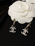 Chanel Double C Gold Diamond Earrings