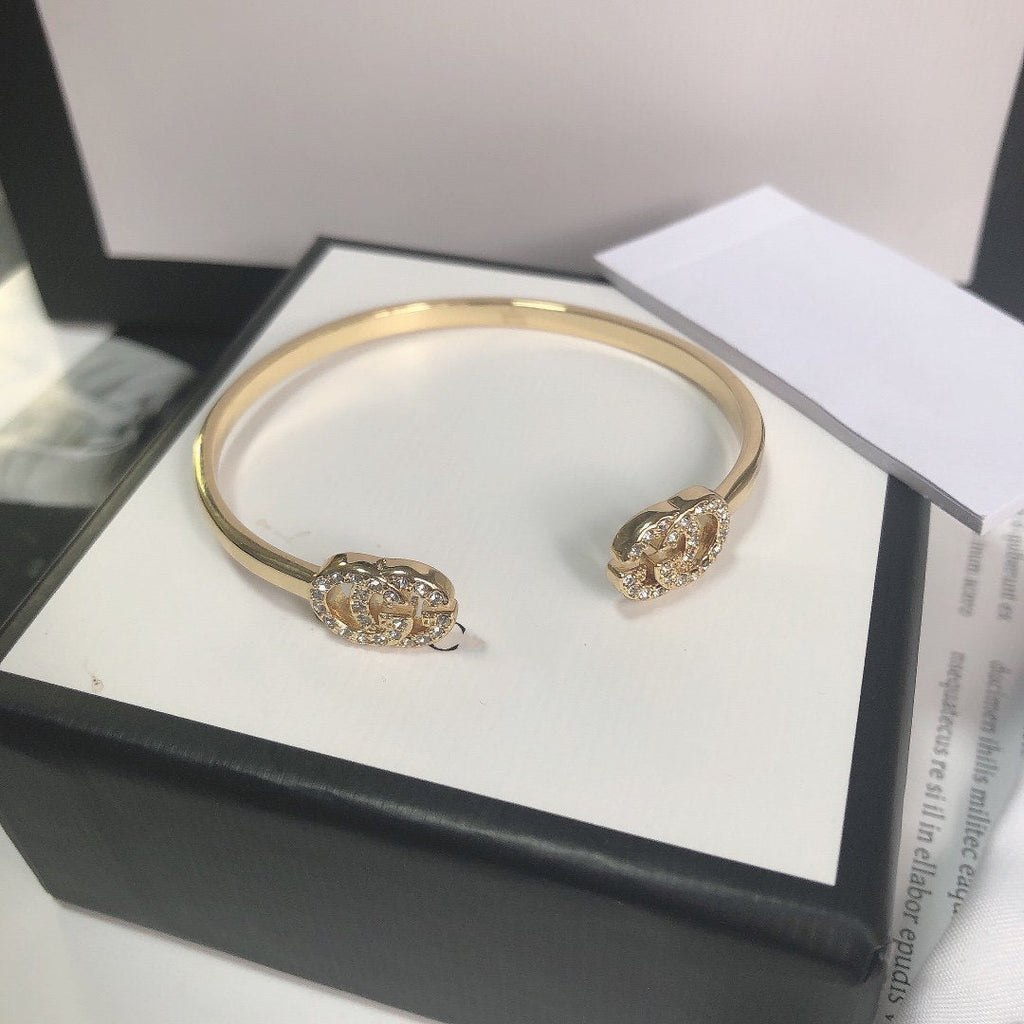 GUCCI GOLD RUNNING DIAMOND LOGO BANGLE BRACELETS